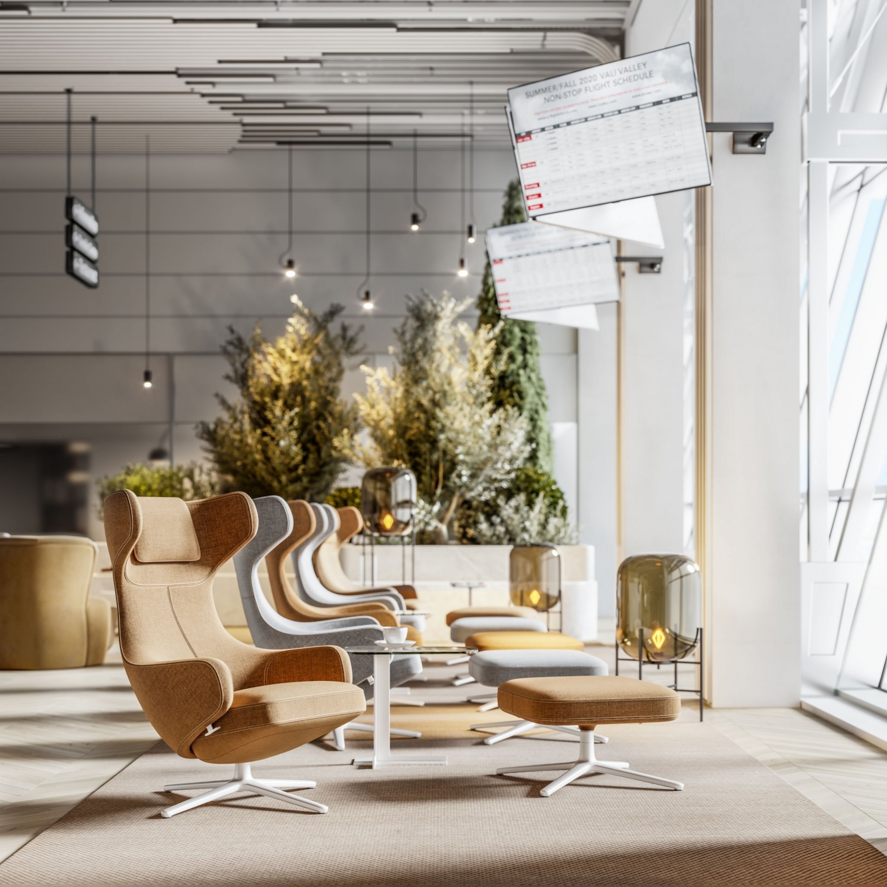 Modern office lounge with armchairs and greenery